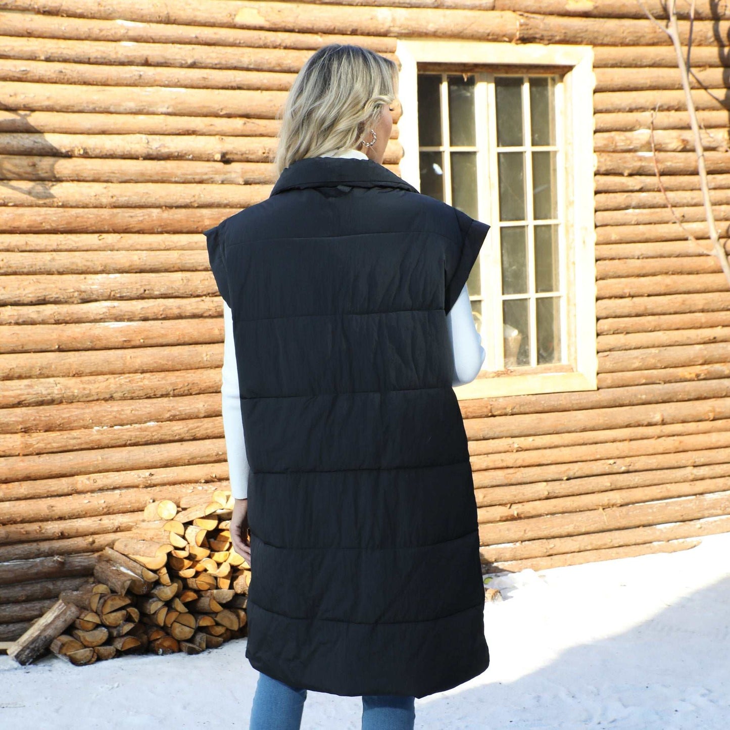 The back of the Women Puffer Vest