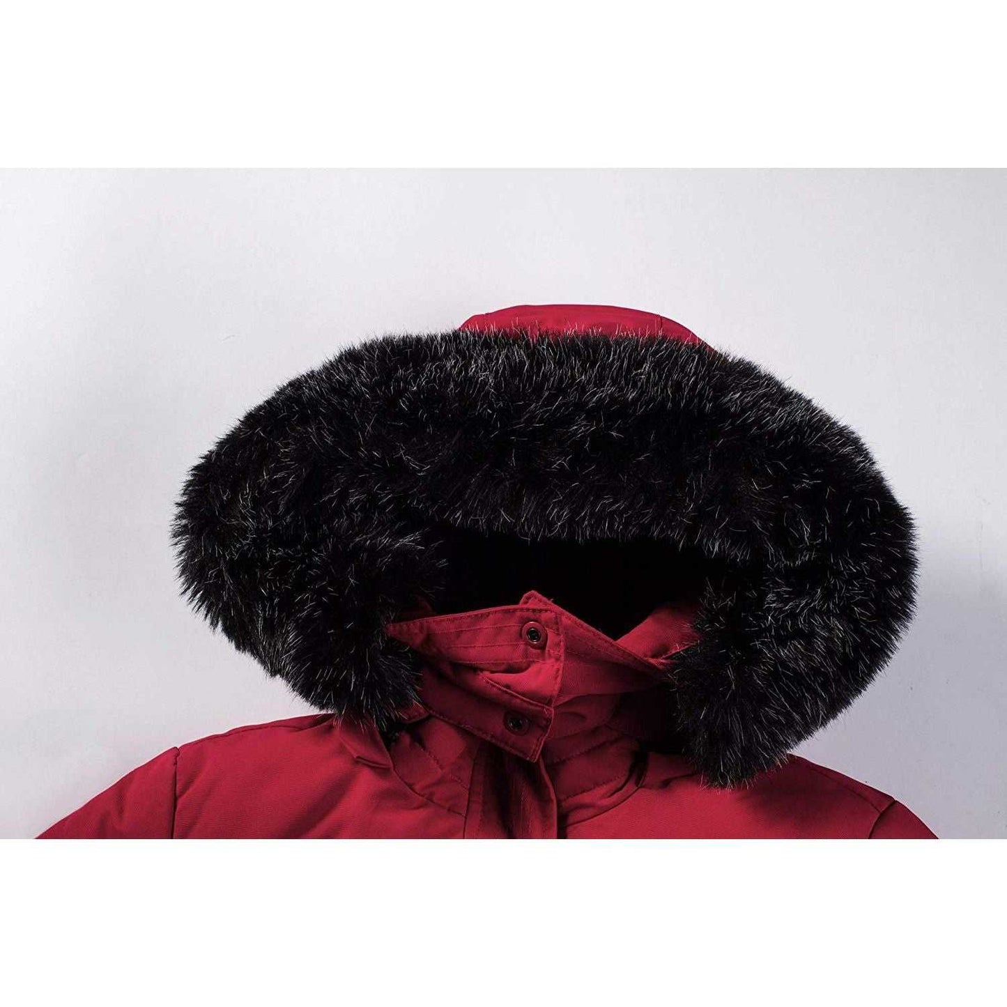 Women's mid-length puffer coat with faux fur hood.Women Winter heavy coat