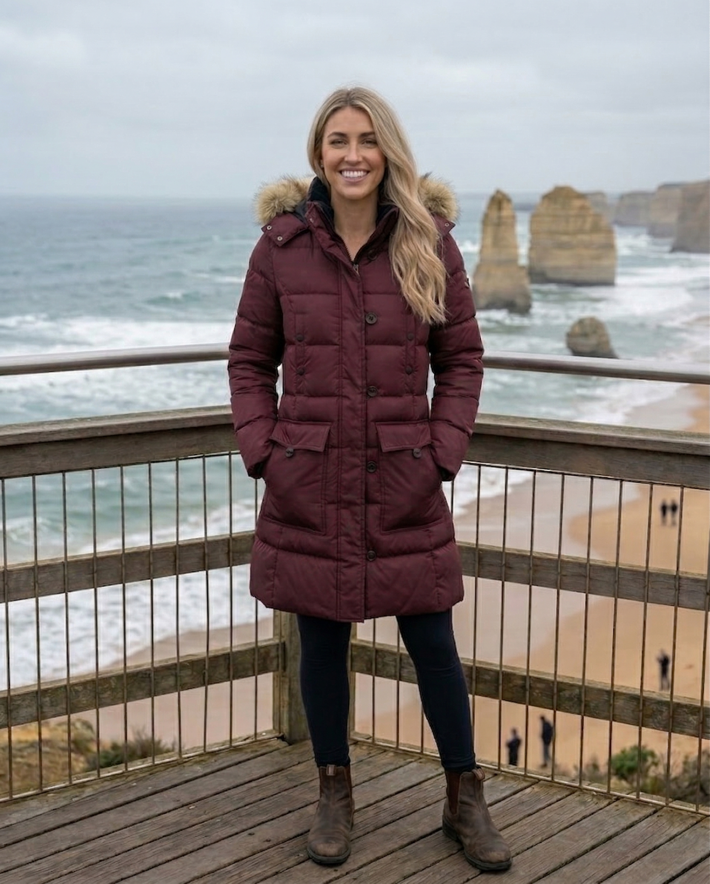 women's mid-length vegan down winter coat in black with hood and multiple pockets