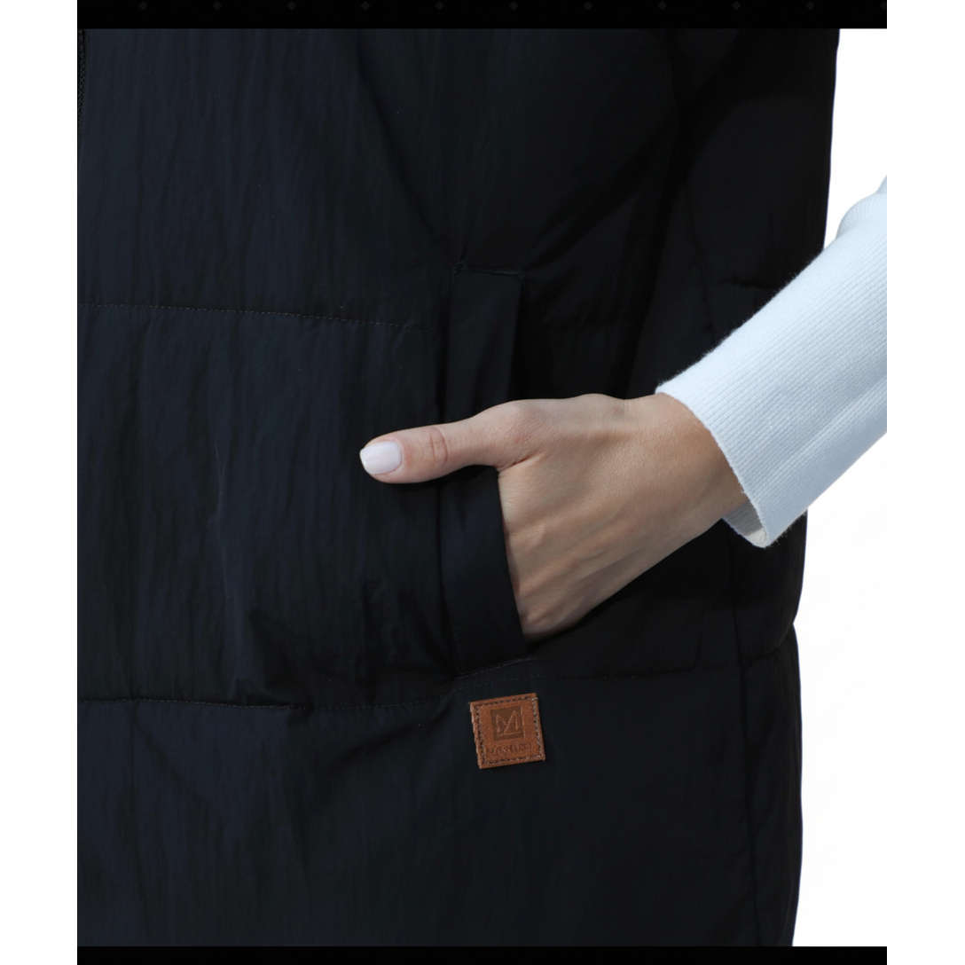 Black vest with a brown patch on a white background