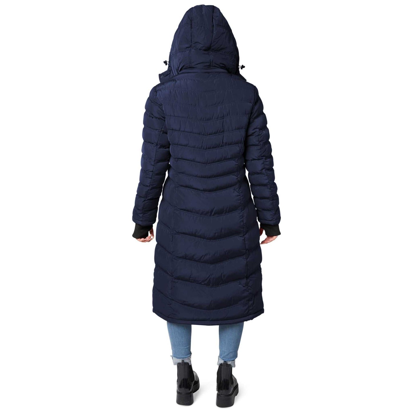 Woman wearing Elora Maxi Puffer vegan winter coat with hood, navy blue, full-length view.