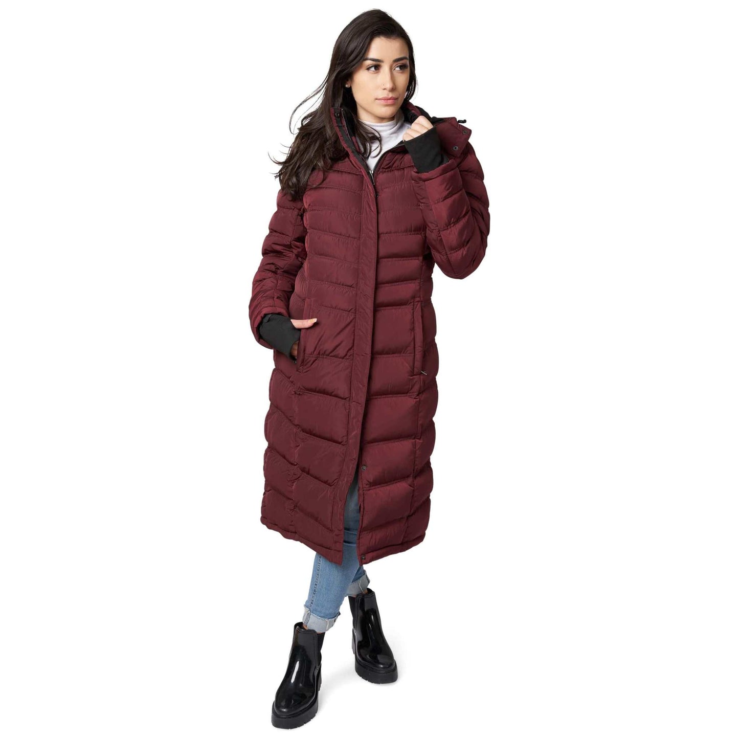 Women's long burgundy winter coat with zipper and detachable hood.