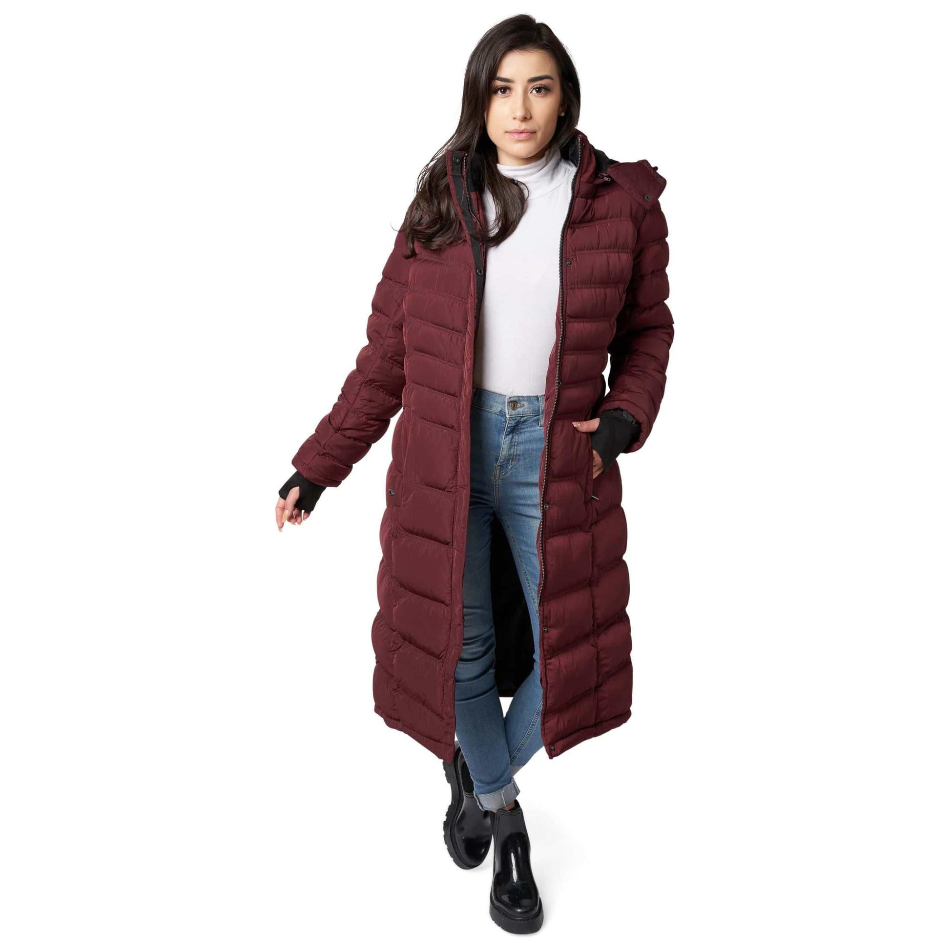 Warm vegan winter coat for women with detachable hood and zippered pockets.