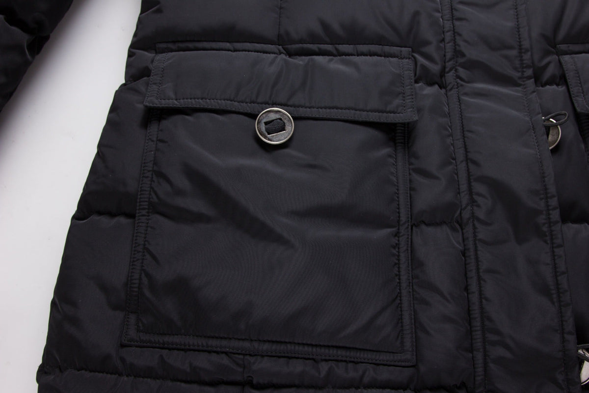Black ELORA 2566 parka cargo pocket with flap and round metal button.