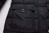 Black ELORA 2566 parka cargo pocket with flap and round metal button.