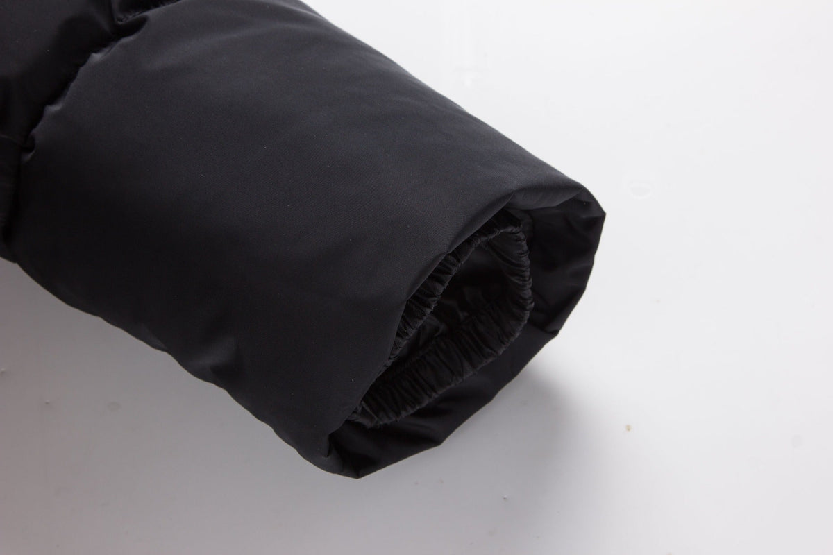 Black ELORA 2566 parka sleeve showing the gathered elastic inner cuff.